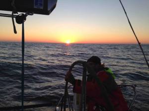 Simon helming (photo by David Stenhouse)